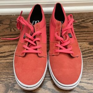 Bright red official color DC Bristol sneakers. Never been worn! Leather upper.